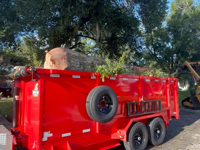 Loaded red dump trailer
